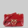 Borsa love puff baby vernice