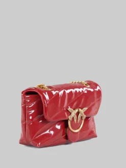 Borsa love puff baby vernice