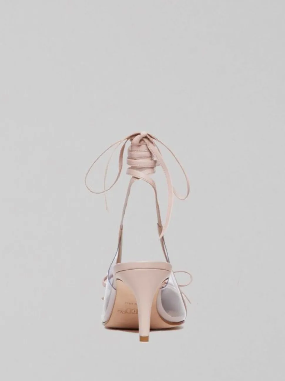DÉCOLLETÉ IN PELLE CON FIOCCO
