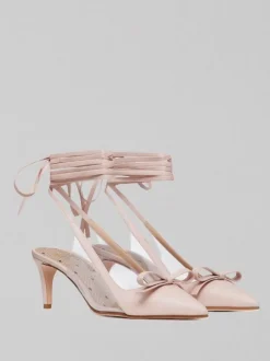 DÉCOLLETÉ IN PELLE CON FIOCCO