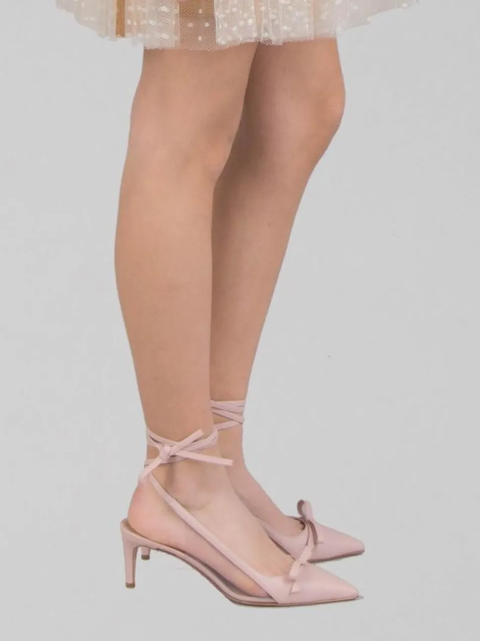 DÉCOLLETÉ IN PELLE CON FIOCCO