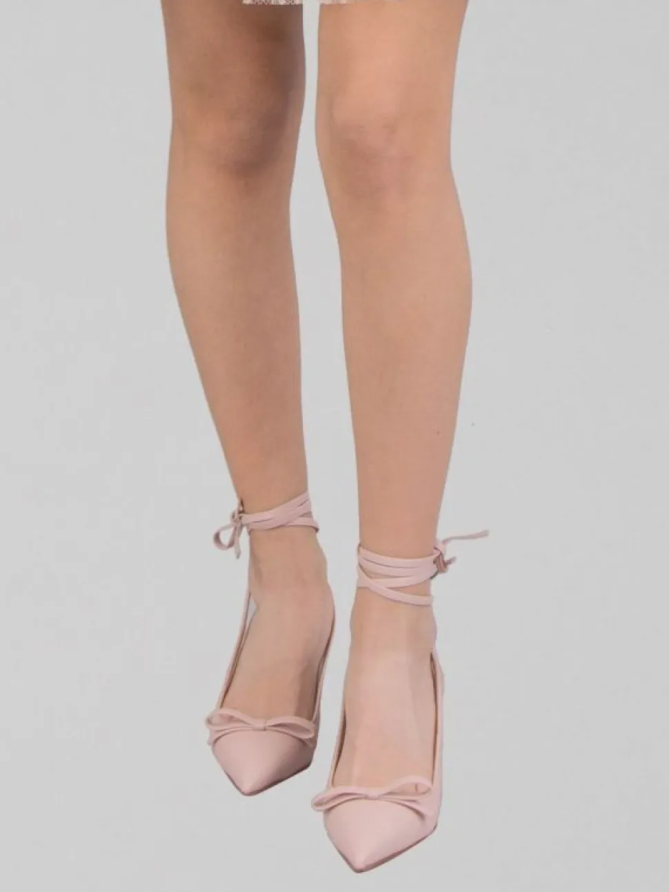 DÉCOLLETÉ IN PELLE CON FIOCCO