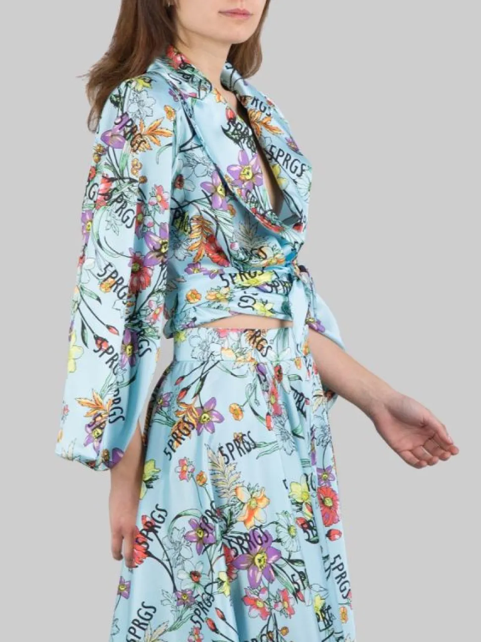 GIACCA CORTA IN TWILL A FANTASIA FLOREALE CON NODO IN VITA