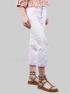 JEANS KOONS ROSA IN COTONE LAVATO CON ROTTURE E BOTTONI GIOIELLO