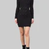 MINI ABITO NERO IN MAGLIA INTRECCIATA CON SCOLLATURA SULLA SCHIENA