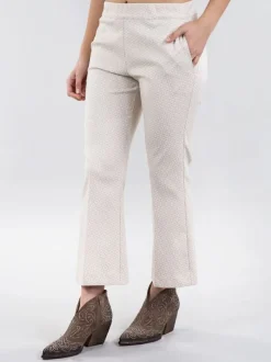 PANTALONI FLARE A FANTASIA JACQUARD CREMA E BIANCO
