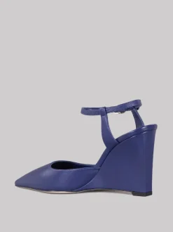 Slingback affusolata con zeppa