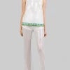 TOP BIANCO SENZA MANICHE CON PAILLETTES E PROFILI DECORATI