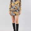ABITO CORTO LEOPARDATO CON GONNA ADERENTE