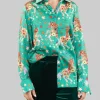 CAMICIA A FANTASIA FIORI E STELLE SU FONDO VERDE