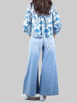 JEANS PALAZZO IN COTONE ELASTICIZZATO CON PICCOLE ROTTURE