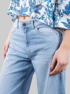 JEANS PALAZZO IN COTONE ELASTICIZZATO CON PICCOLE ROTTURE