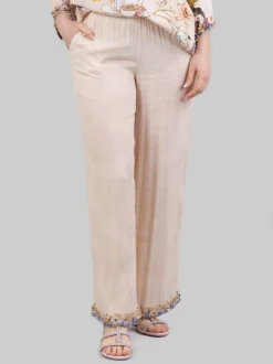 PANTALONI IN MISTO SETA SABBIA CON DECORAZIONI IN PERLINE, STRASS E PIETRE COLORATE