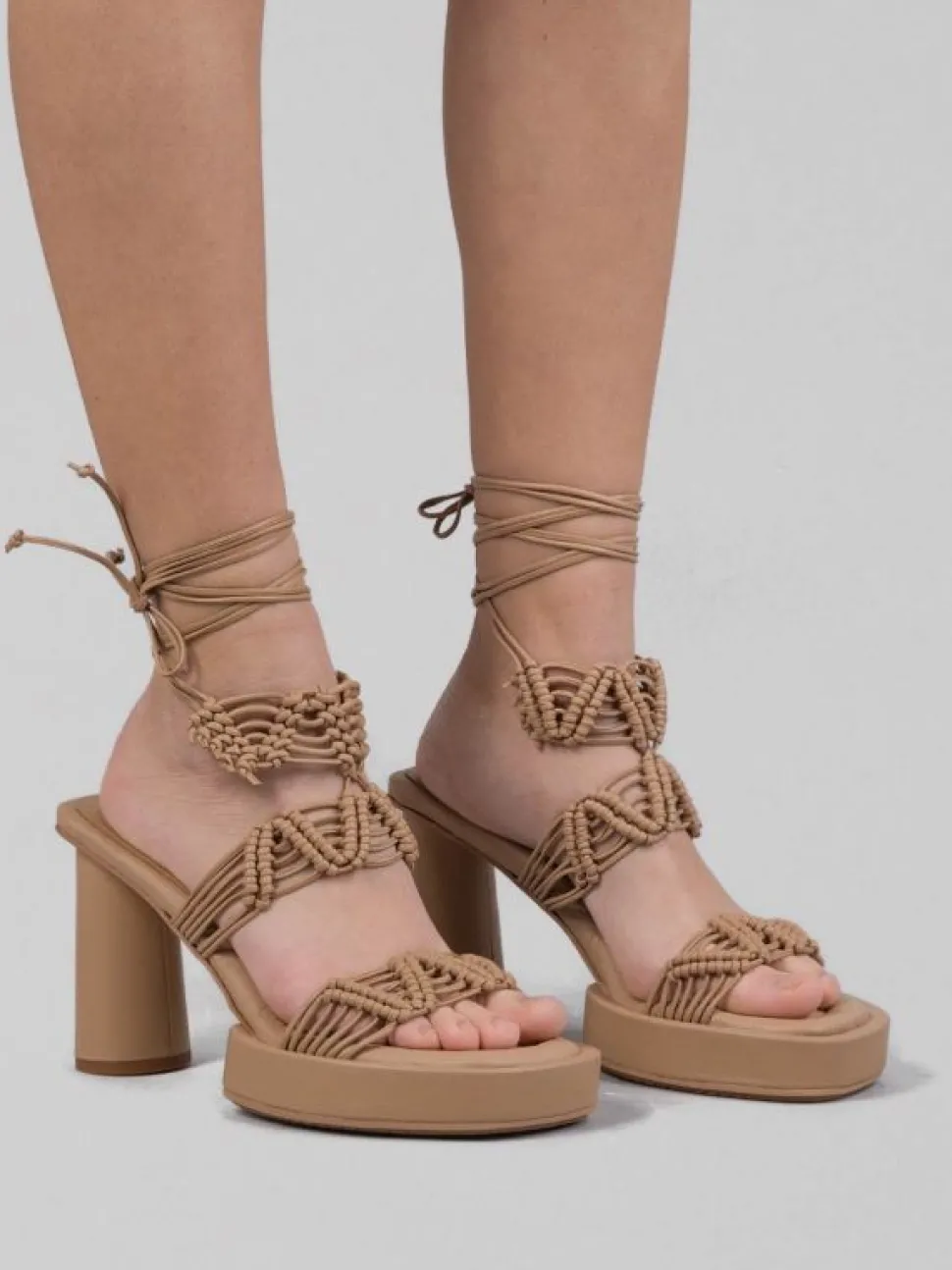 SANDALI ALTI IN PELLE INTRECCIATA